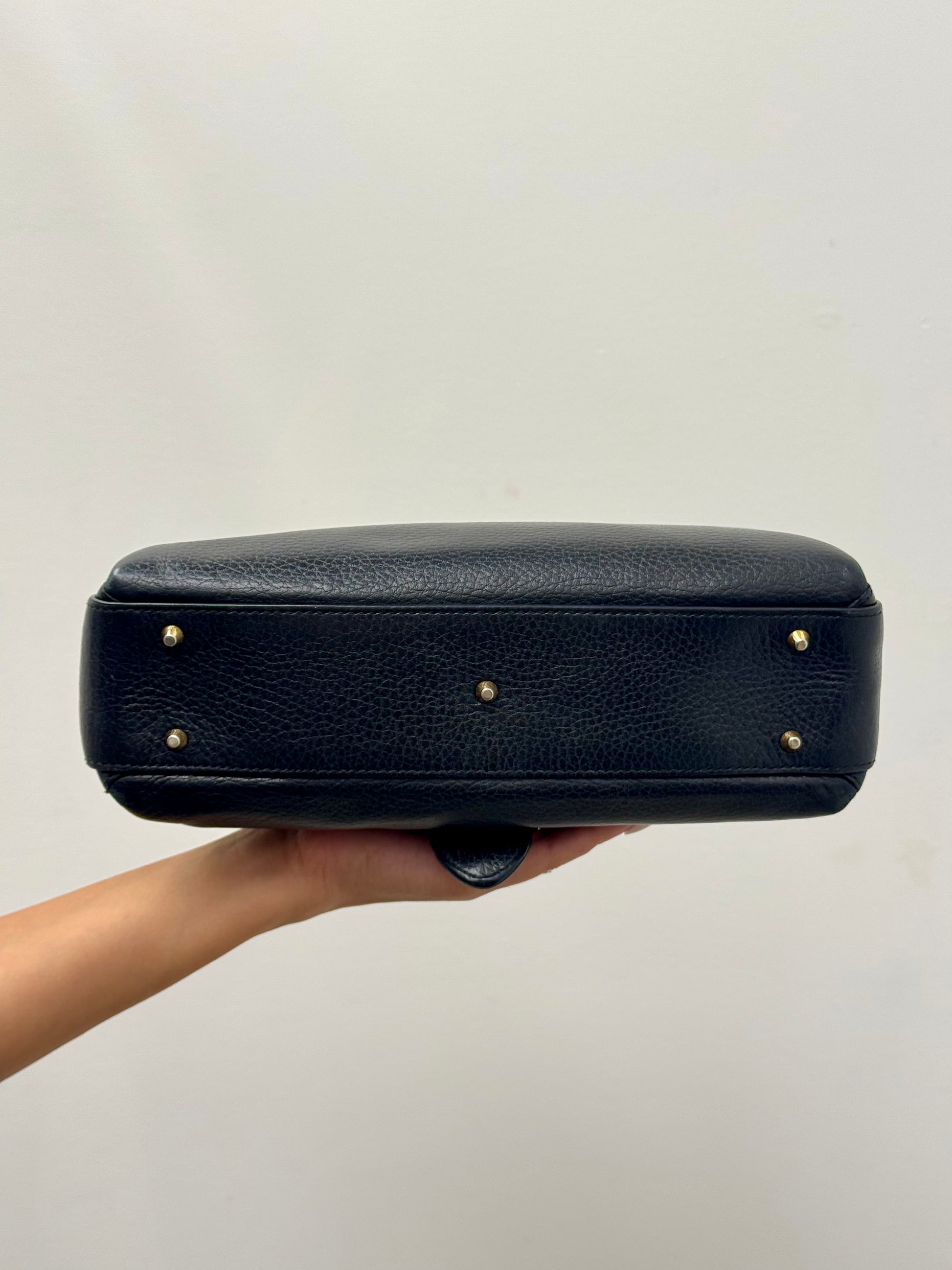 Gucci Interlocking G top handle bag.