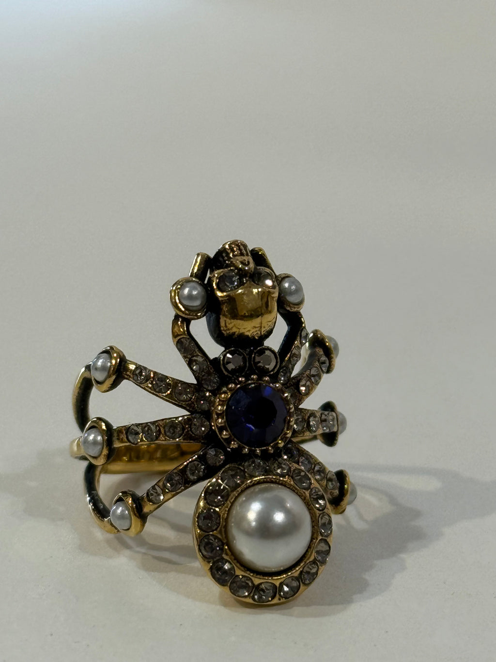 Alexander McQueen gold tone crystal and pearl spider statement ring