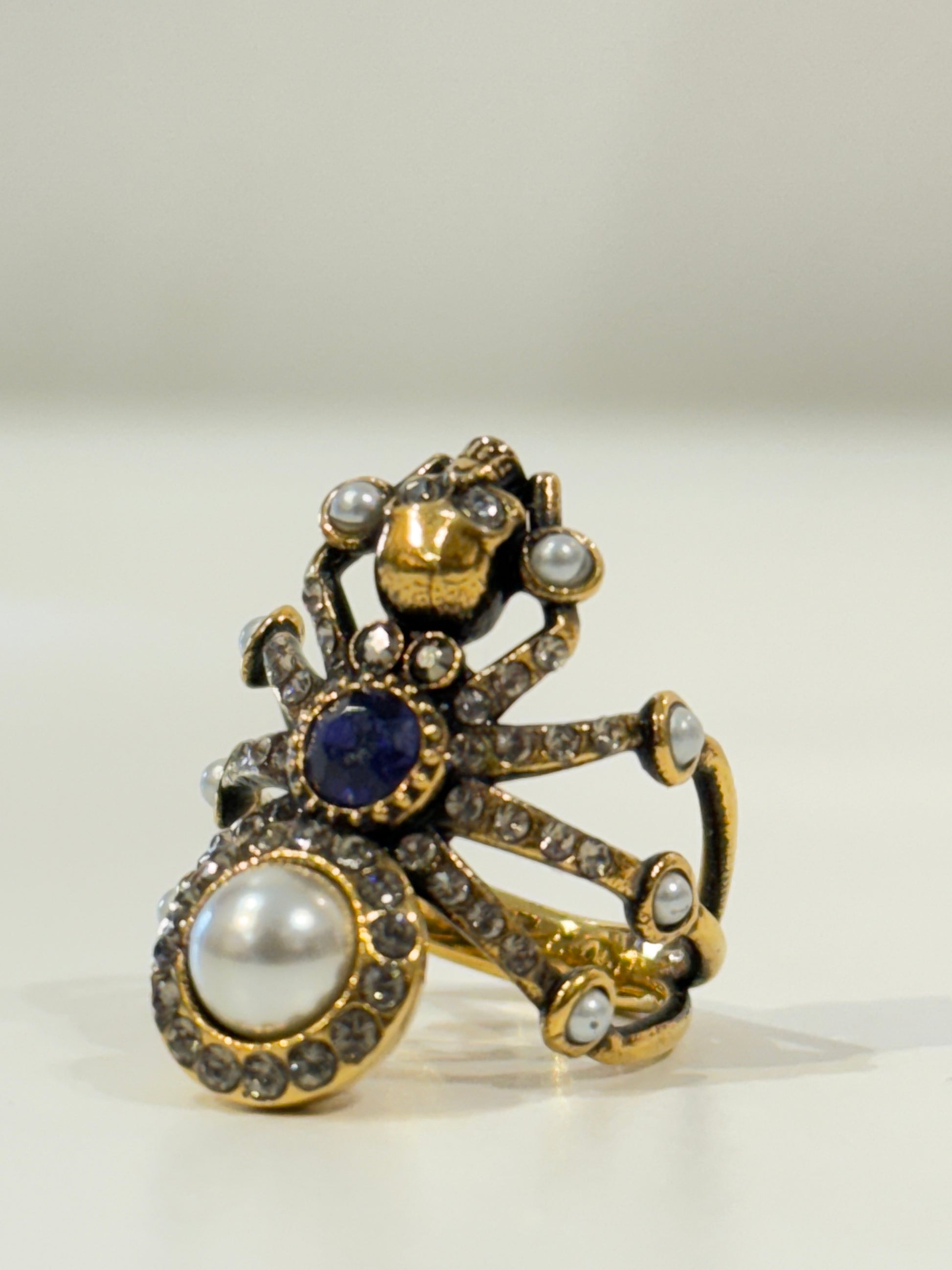 Alexander McQueen gold tone crystal and pearl spider statement ring