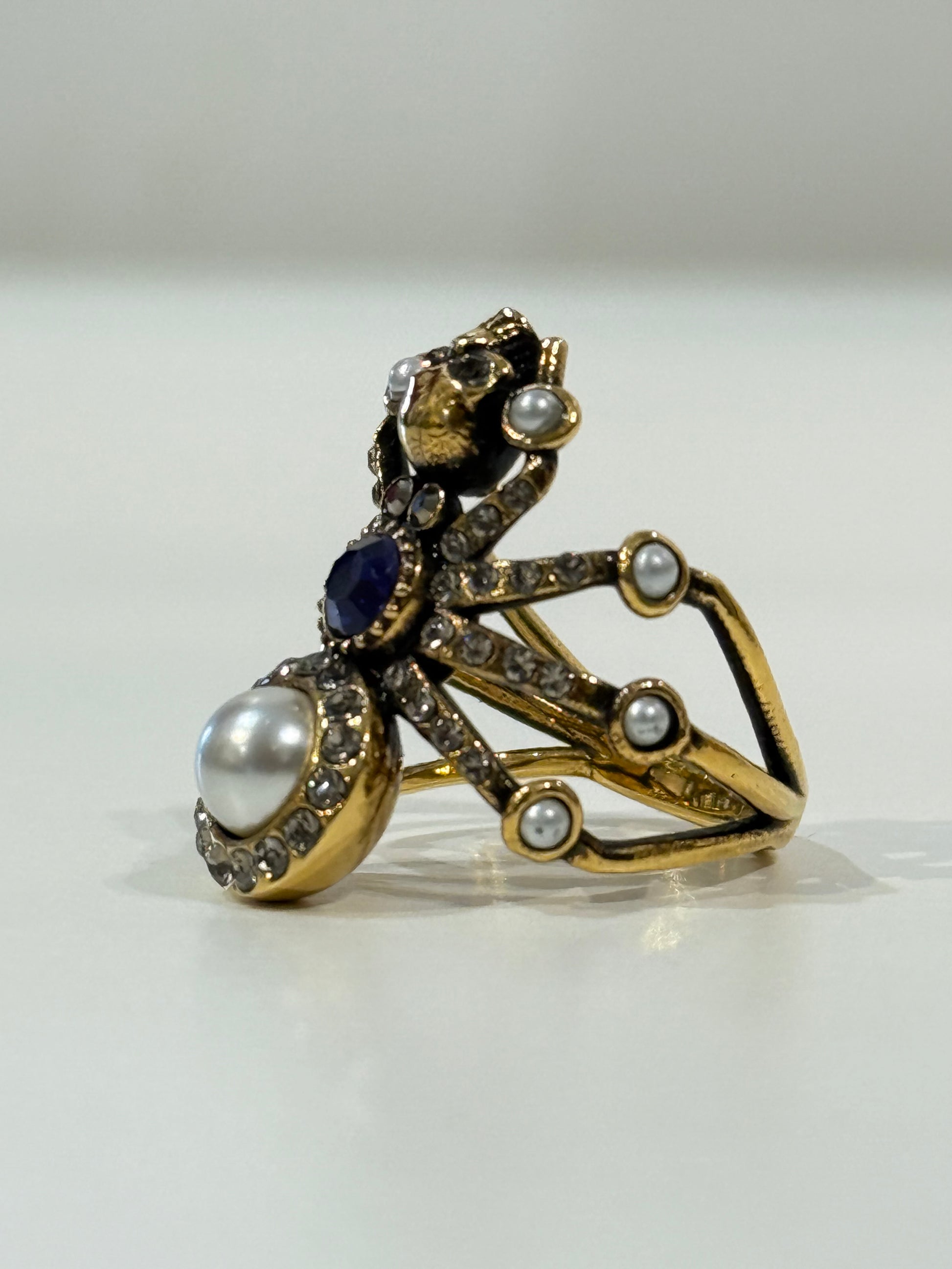 Alexander McQueen gold tone crystal and pearl spider statement ring