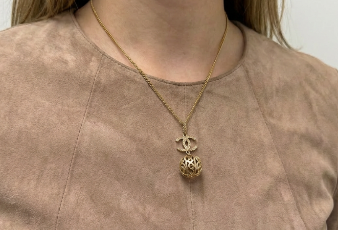 Chanel 06P Gold Tone Filigree Ball & CC Charm Necklace