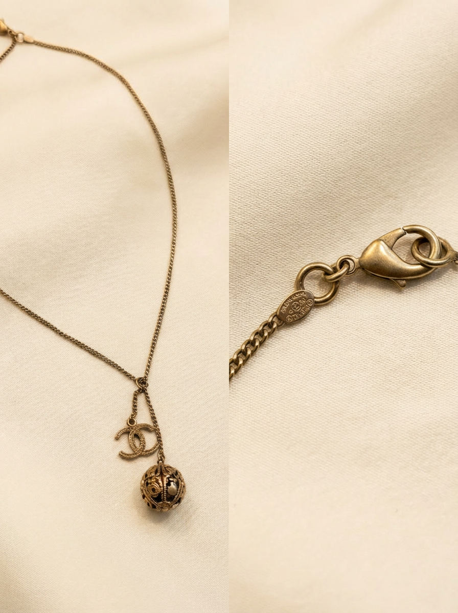 Chanel 06P Gold Tone Filigree Ball & CC Charm Necklace